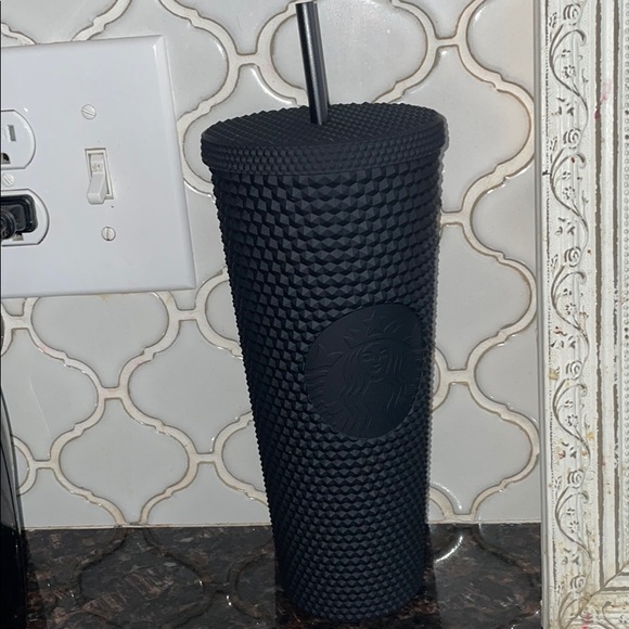 Black studded Starbucks cup